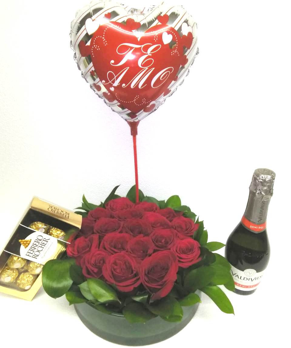 Florero redondo con 18 Rosas, Bombones Ferrero Rocher 100grs, Champagne 375cc  y Globito